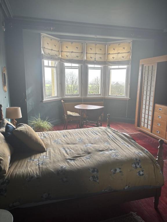 Postel nebo postele na pokoji v ubytování Ballynona House