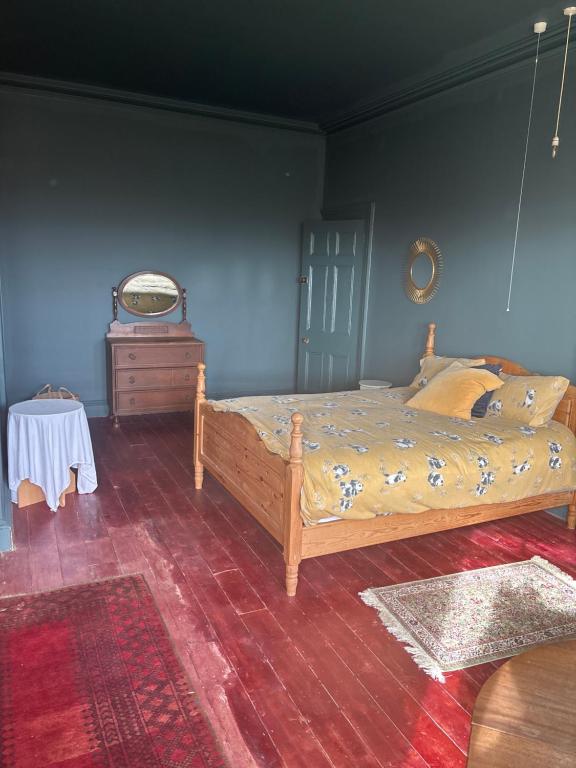 Postel nebo postele na pokoji v ubytování Ballynona House