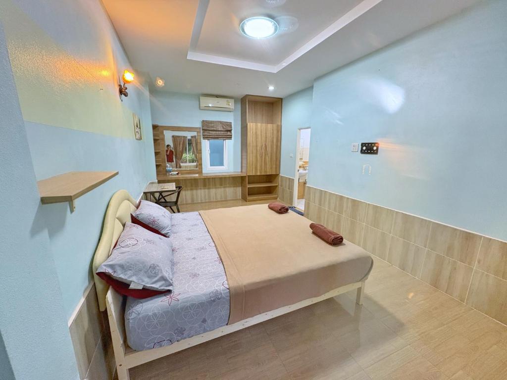 Postel nebo postele na pokoji v ubytování Krabi Ava Hill