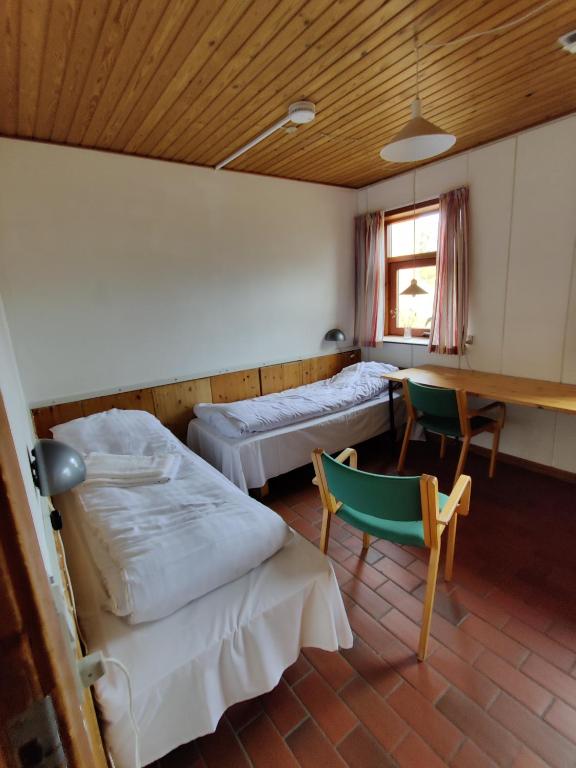 Postel nebo postele na pokoji v ubytování Thy Event & Naturcenter