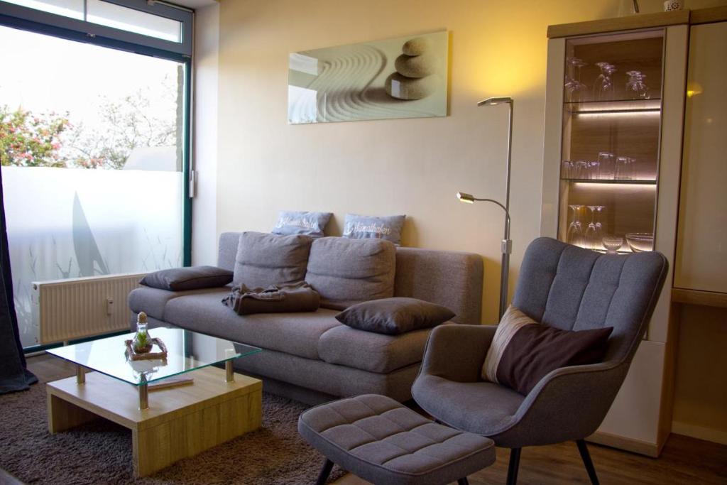 Posezení v ubytování Inselblume 48 - Kuschlige Ferienwohnung in der Strandburg