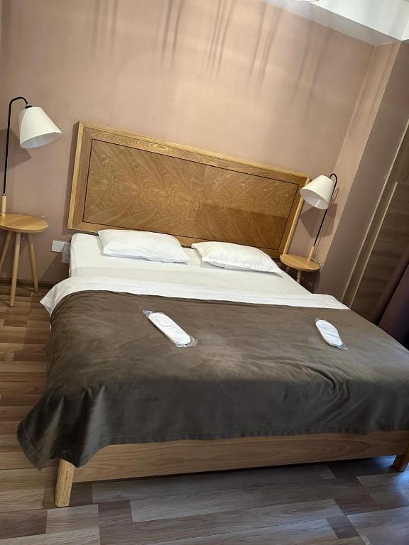 Postel nebo postele na pokoji v ubytování Hotel cozy jano