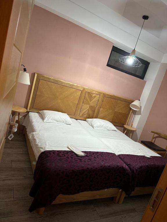 Postel nebo postele na pokoji v ubytování Hotel cozy jano