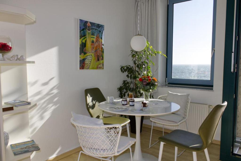 Posezení v ubytování Inselblume 17 - Gemütliche Ferienwohnung mit Meerblick in der Strandburg