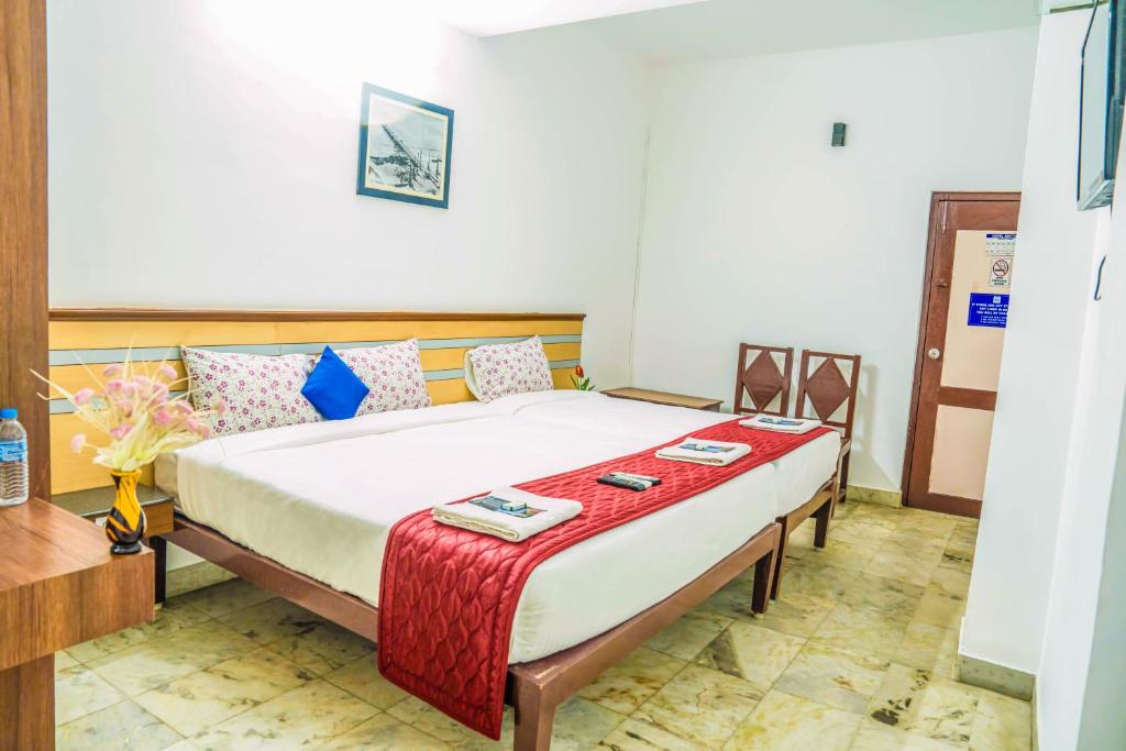 Postel nebo postele na pokoji v ubytování VKG Hotels