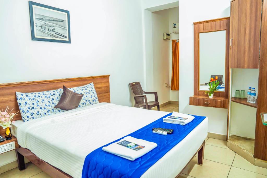 Postel nebo postele na pokoji v ubytování VKG Hotels