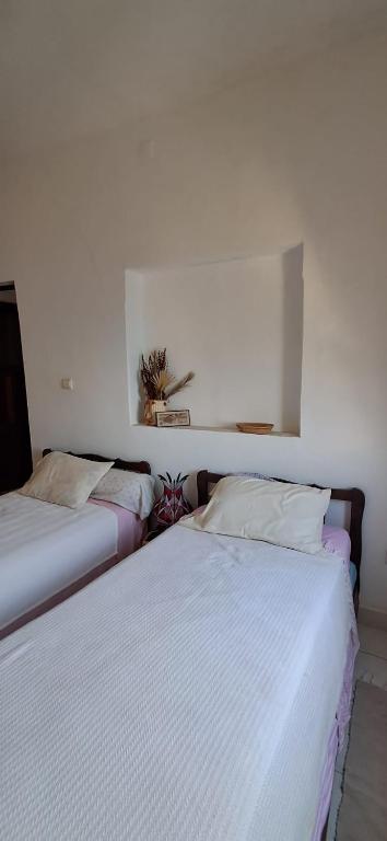 Postel nebo postele na pokoji v ubytování Casa Tota