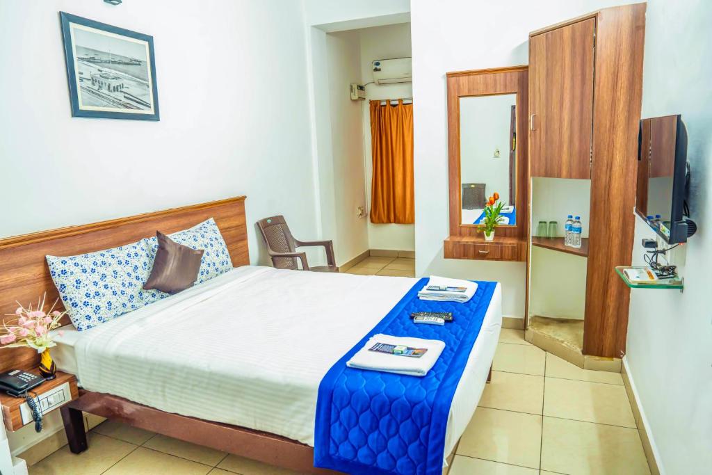 Postel nebo postele na pokoji v ubytování VKG Hotels