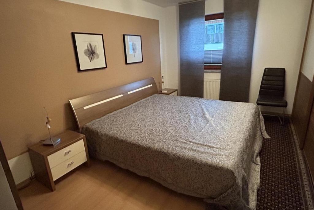 Ένα ή περισσότερα κρεβάτια σε δωμάτιο στο Private Rooms