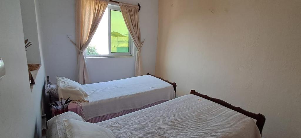 Postel nebo postele na pokoji v ubytování Casa Tota