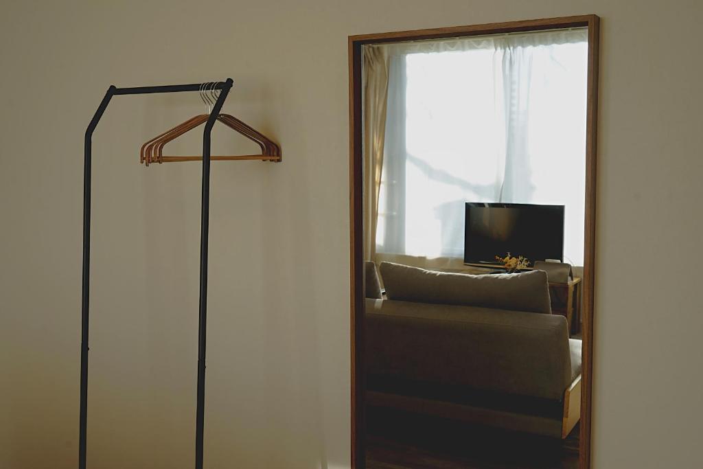 TV a/nebo společenská místnost v ubytování wanderlust STAY