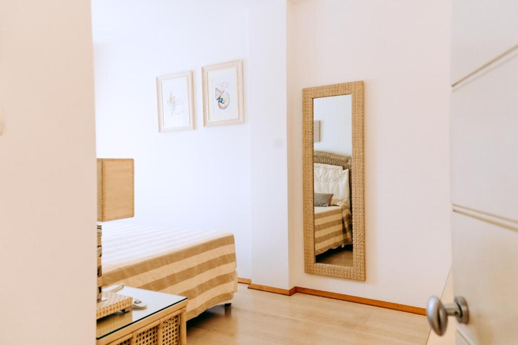 Postel nebo postele na pokoji v ubytování Relais Valle Dell'Idro