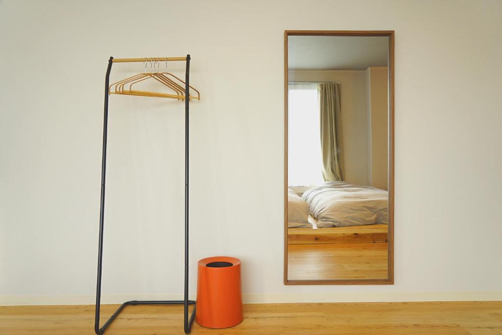 Postel nebo postele na pokoji v ubytování wanderlust STAY