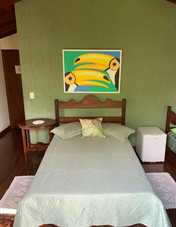 Postel nebo postele na pokoji v ubytování Hospedaria Da Nadia