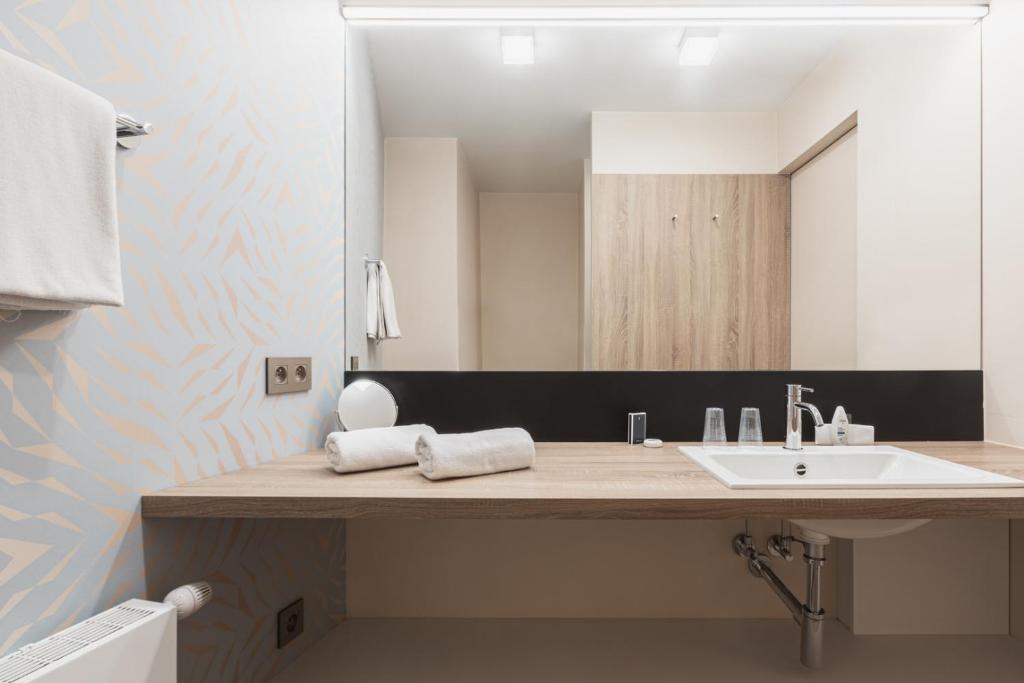 Koupelna v ubytování Hotel Amfora