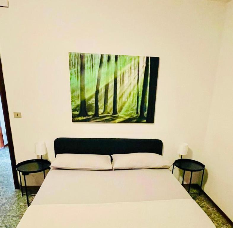 Postel nebo postele na pokoji v ubytování Mamisà App centro Schio, parcheggio coperto