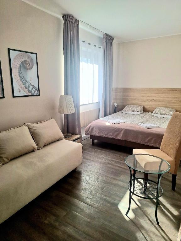 Posteľ alebo postele v izbe v ubytovaní B & B Tomula