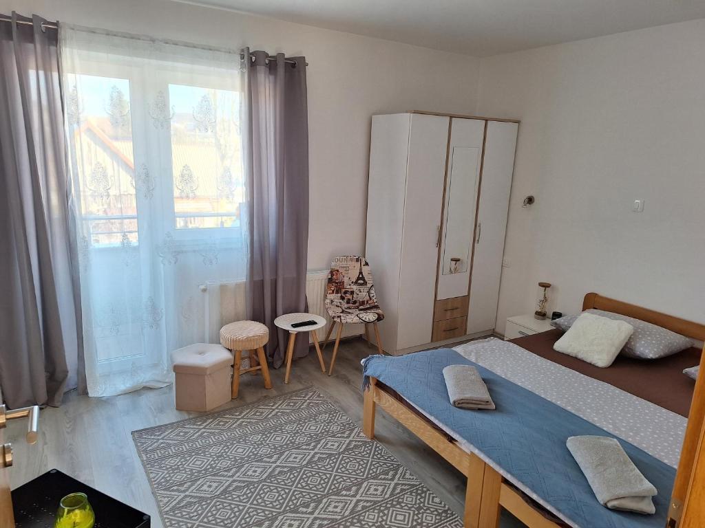 Postel nebo postele na pokoji v ubytování Sobe Sky