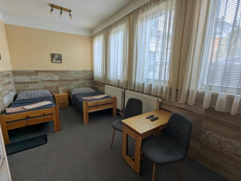 Postel nebo postele na pokoji v ubytování Hotel Alfa
