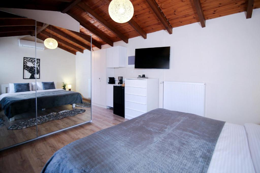 Postel nebo postele na pokoji v ubytování Oiti Mountain Apartments
