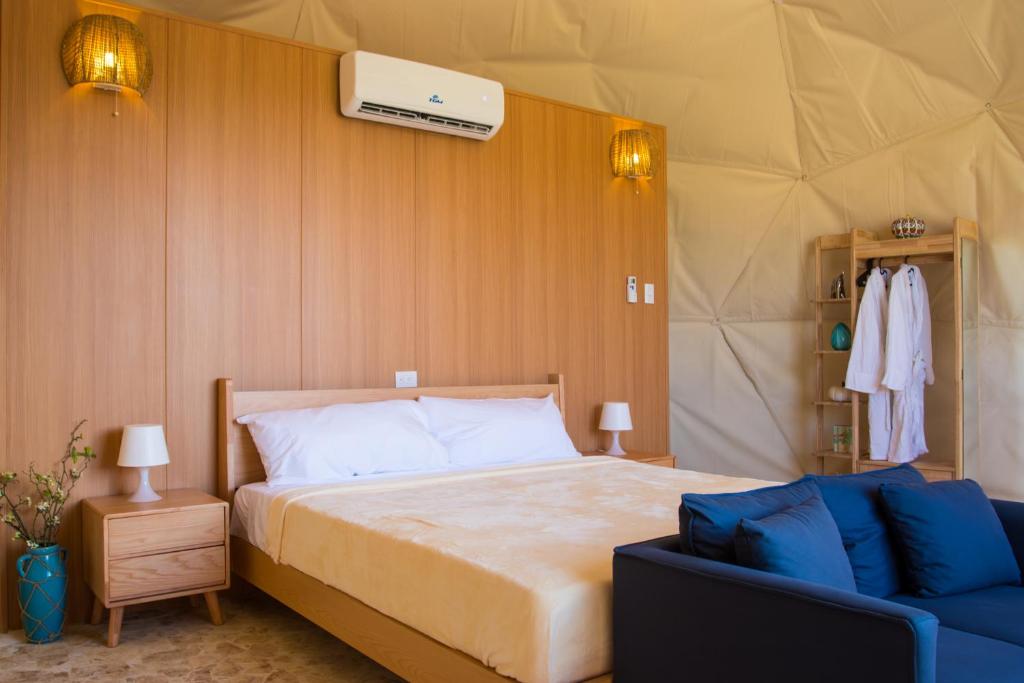Postel nebo postele na pokoji v ubytování Santa Fe Club