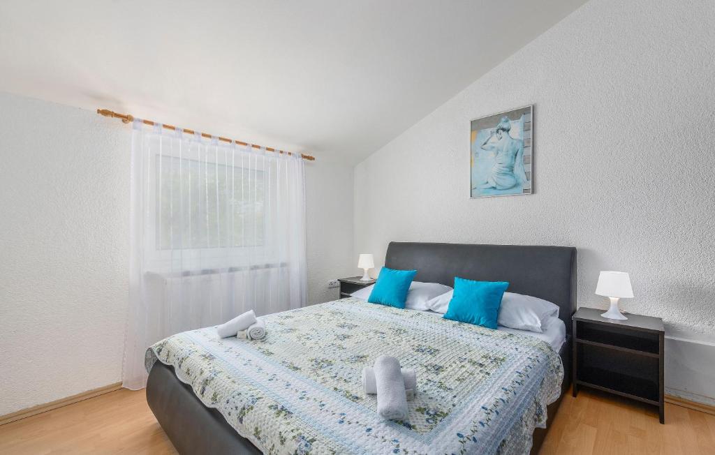 Ένα ή περισσότερα κρεβάτια σε δωμάτιο στο Appartement In Funtana Mit Grill