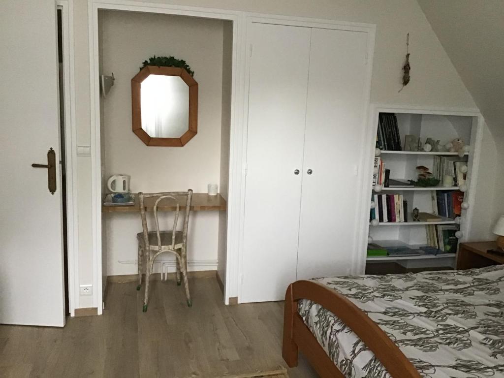 Postel nebo postele na pokoji v ubytování Le Pas du Faon