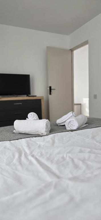 Postel nebo postele na pokoji v ubytování LaLa HOME