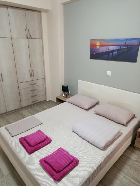 Ένα ή περισσότερα κρεβάτια σε δωμάτιο στο Alimos Apartments