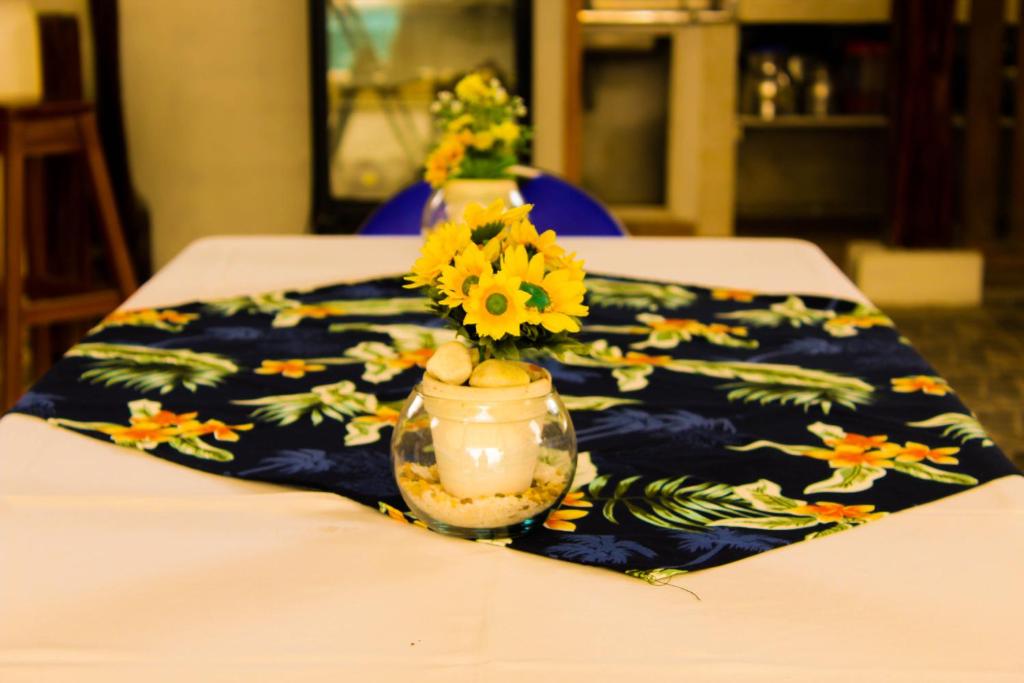 Postel nebo postele na pokoji v ubytování Hotel Utüane