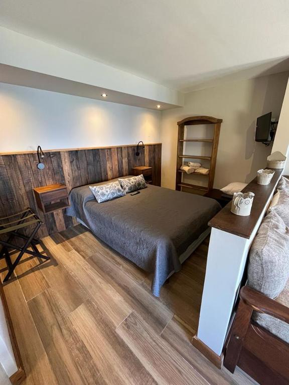 Postel nebo postele na pokoji v ubytování La Caleta Bungalows
