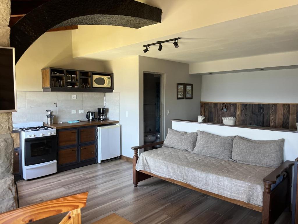 Kuchyň nebo kuchyňský kout v ubytování La Caleta Bungalows