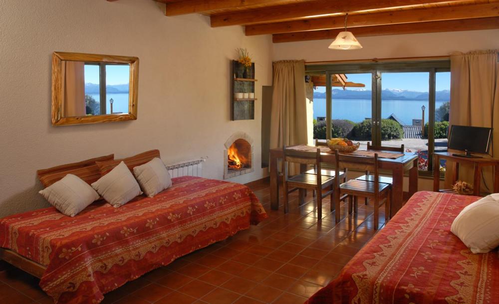 Postel nebo postele na pokoji v ubytování La Caleta Bungalows