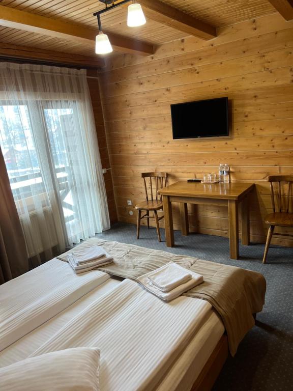 Postel nebo postele na pokoji v ubytování La Кrechunu