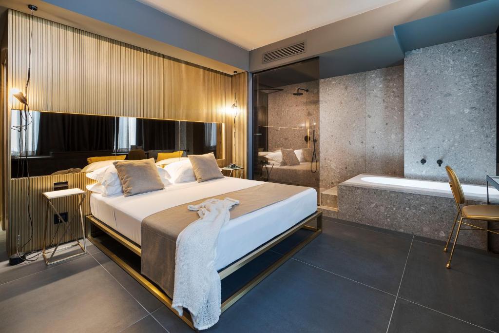 Postel nebo postele na pokoji v ubytování Catania Smart Hotel