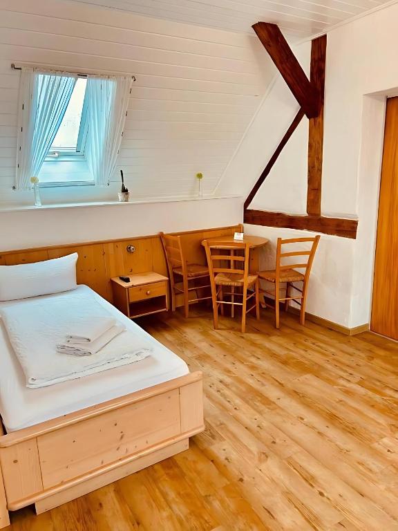 Postel nebo postele na pokoji v ubytování Gästehaus Ludwig