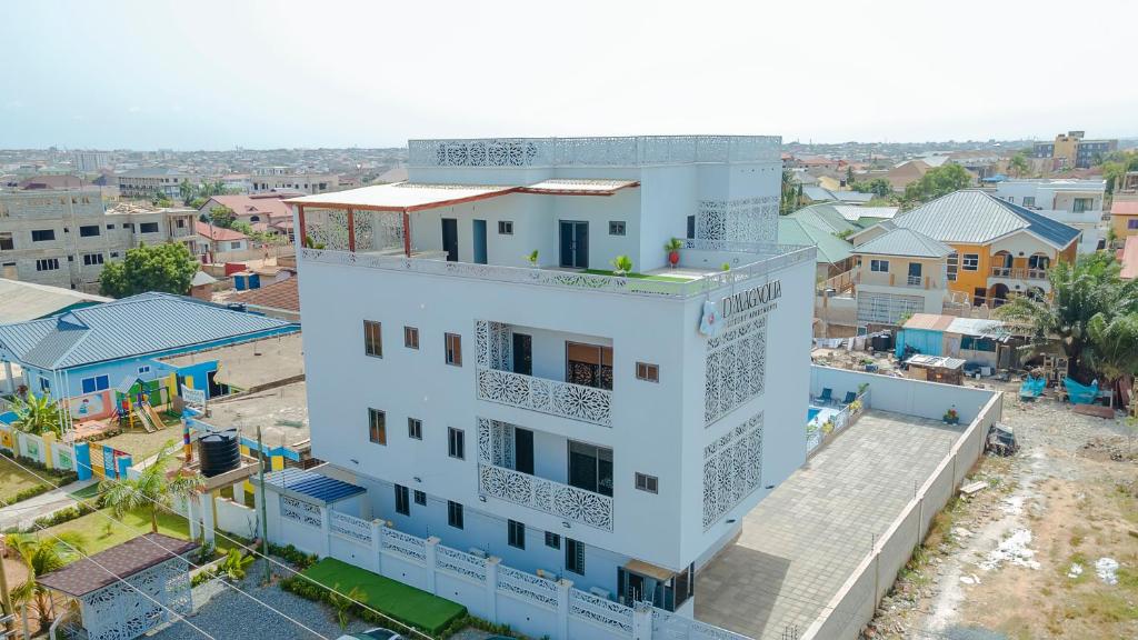 an aerial view of a white building at D'Magnolia Luxury Apartments in Ogbojo