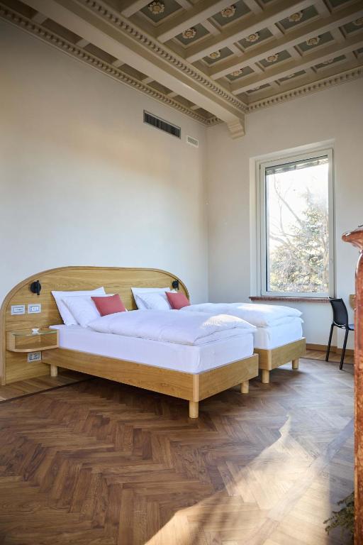 Postel nebo postele na pokoji v ubytování Villa Hermann
