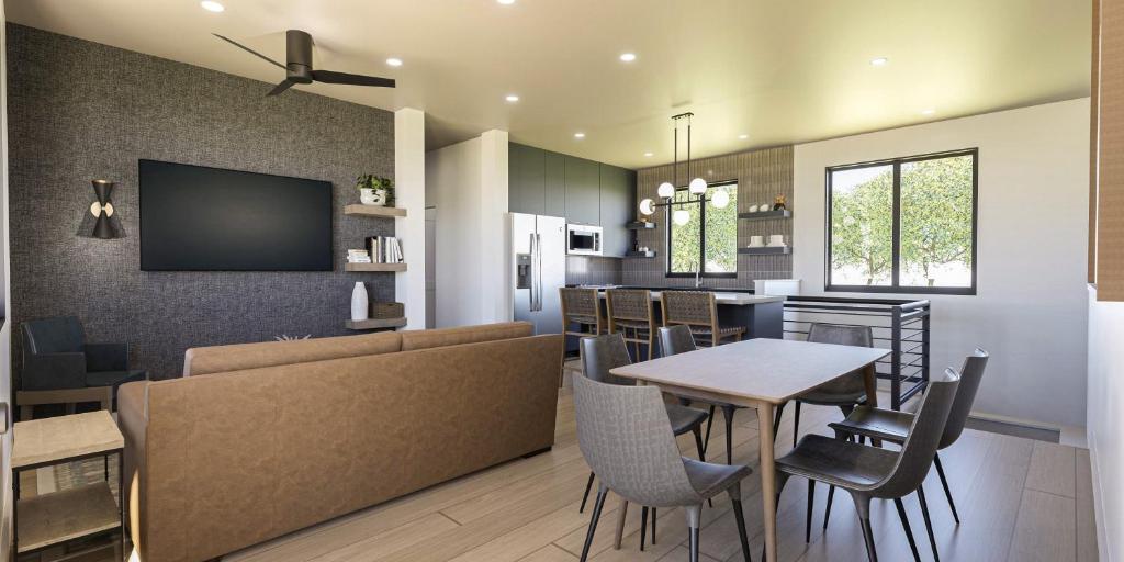 a living room with a couch and a table at Montclair at Zion in Springdale