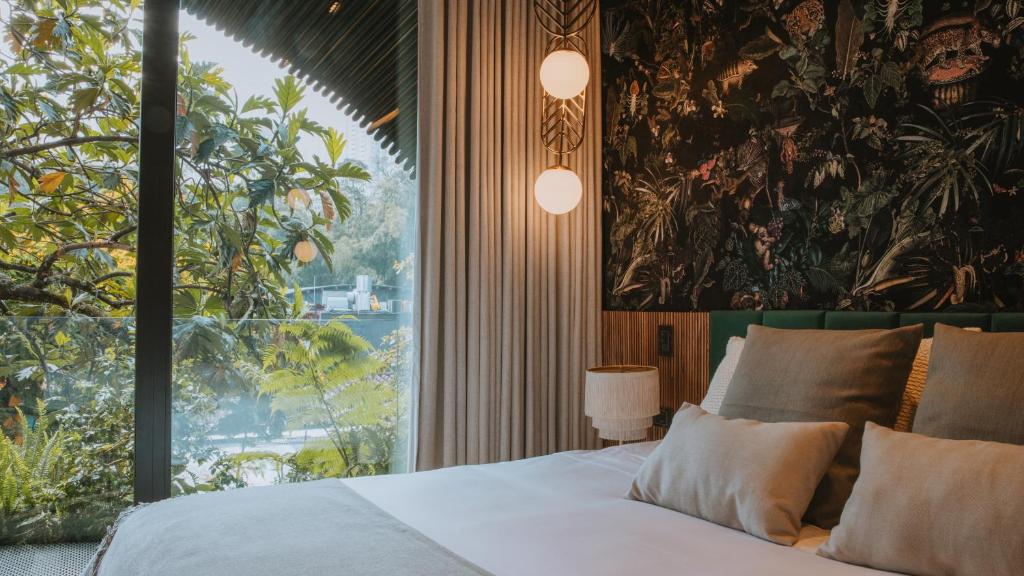 Postel nebo postele na pokoji v ubytování Selvario 36 Hotel
