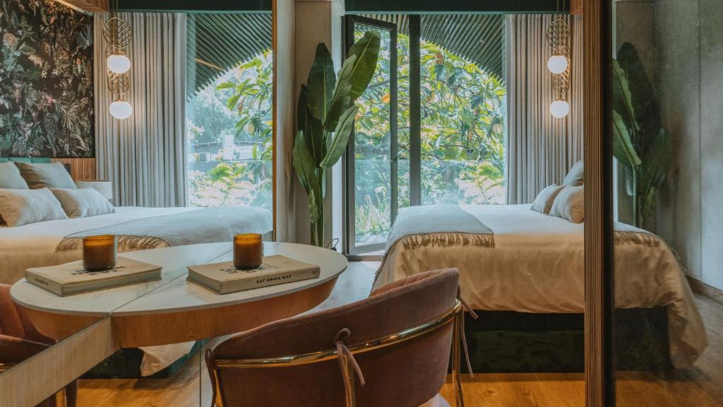 Postel nebo postele na pokoji v ubytování Selvario 36 Hotel