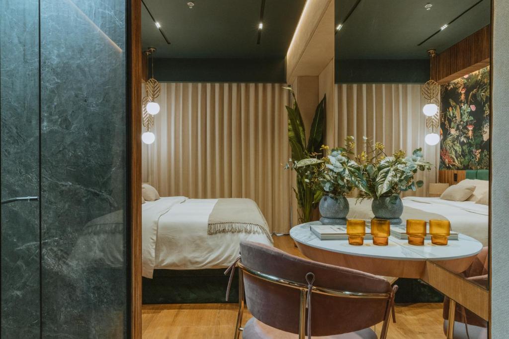 Postel nebo postele na pokoji v ubytování Selvario 36 Hotel