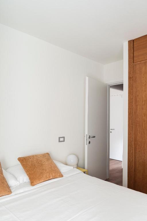 Letto o letti in una camera di Appartamenti Corte Residence
