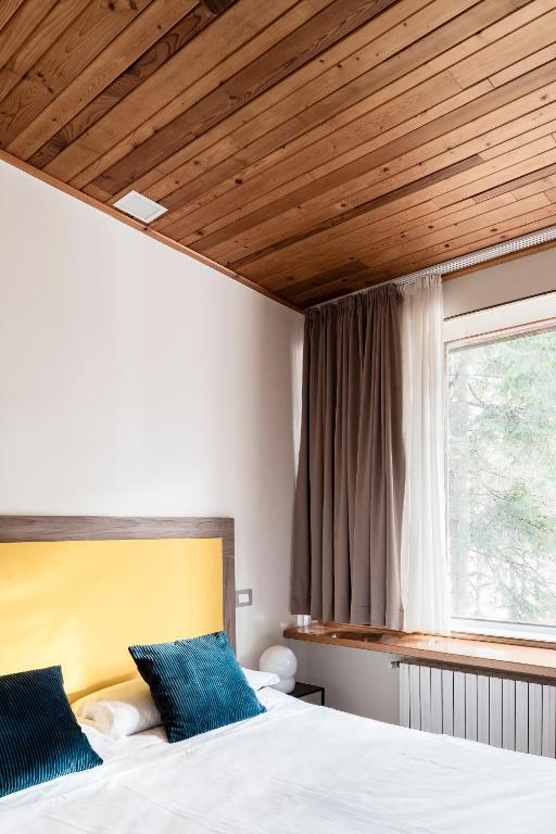 Letto o letti in una camera di Appartamenti Corte Residence