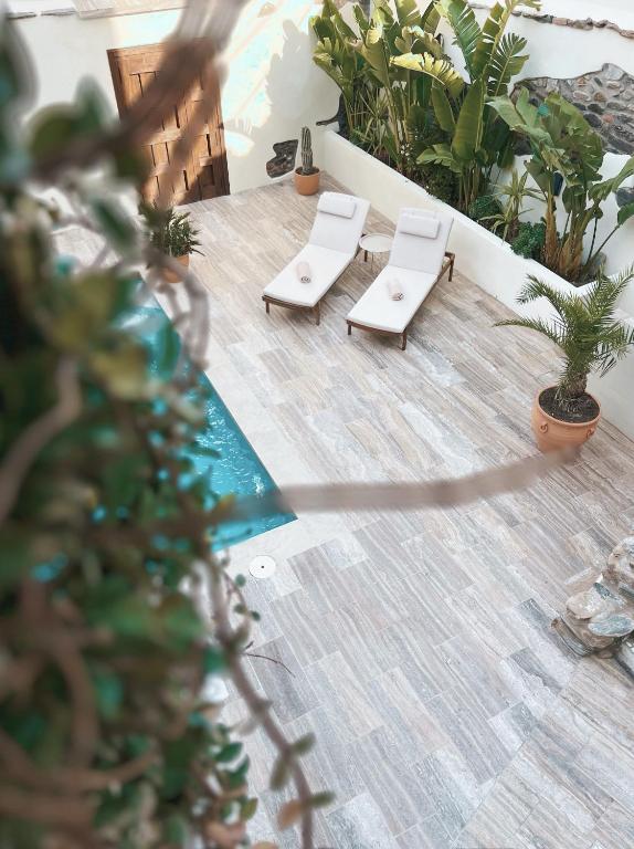 Patio nebo venkovní prostory v ubytování Elysium Luxury Stays
