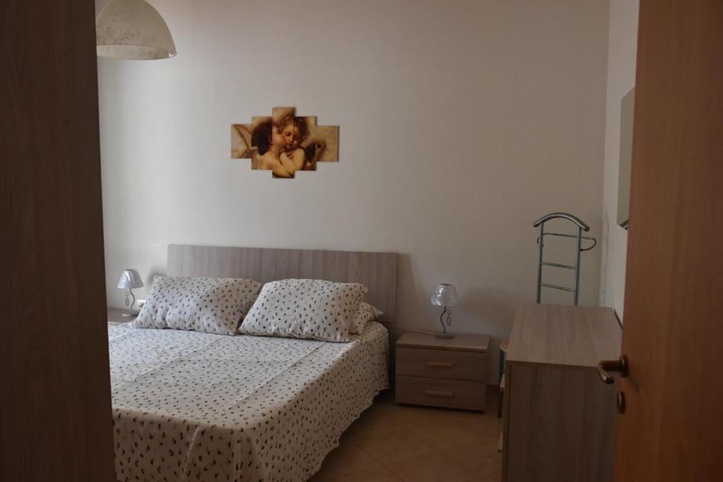 Ένα ή περισσότερα κρεβάτια σε δωμάτιο στο Vento Libero