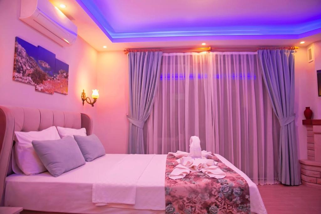 Postel nebo postele na pokoji v ubytování Suna House
