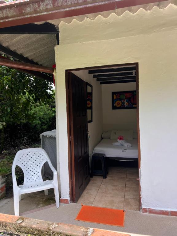 Postel nebo postele na pokoji v ubytování Paraiso Cocora