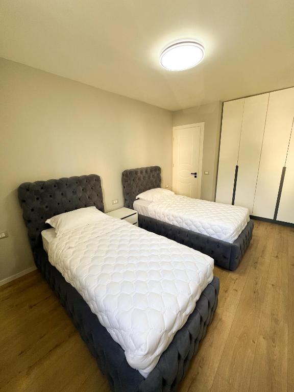 Postel nebo postele na pokoji v ubytování Sea View Apartments