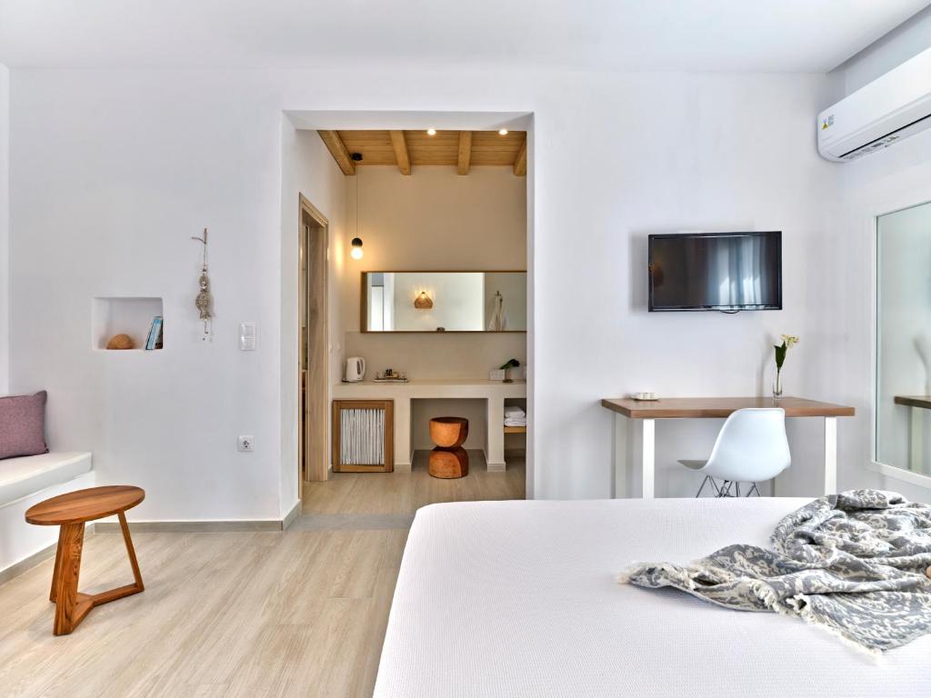TV a/nebo společenská místnost v ubytování Aella Residence